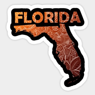 Colorful mandala art map of Florida with text in brown and orange Sticker